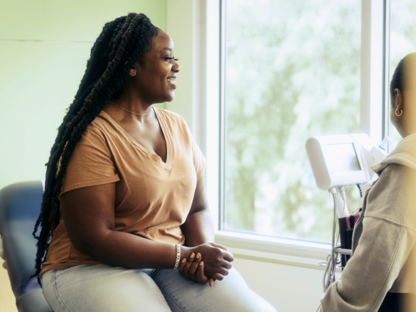Woman sitting in doctor's office